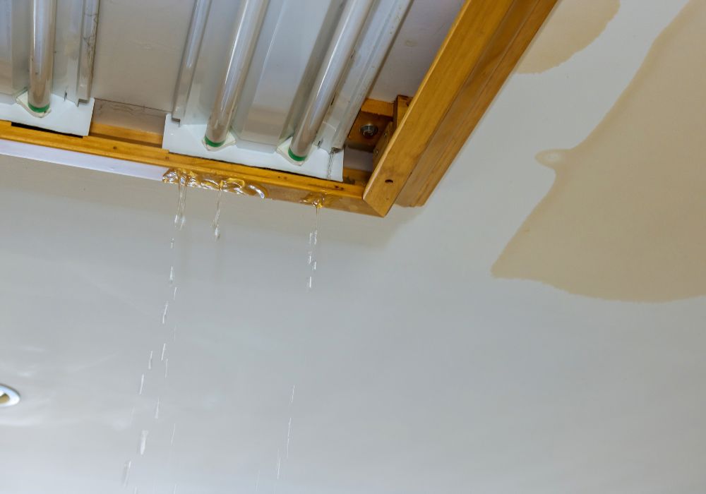 broken water pipe leaking causes water damage from ceiling